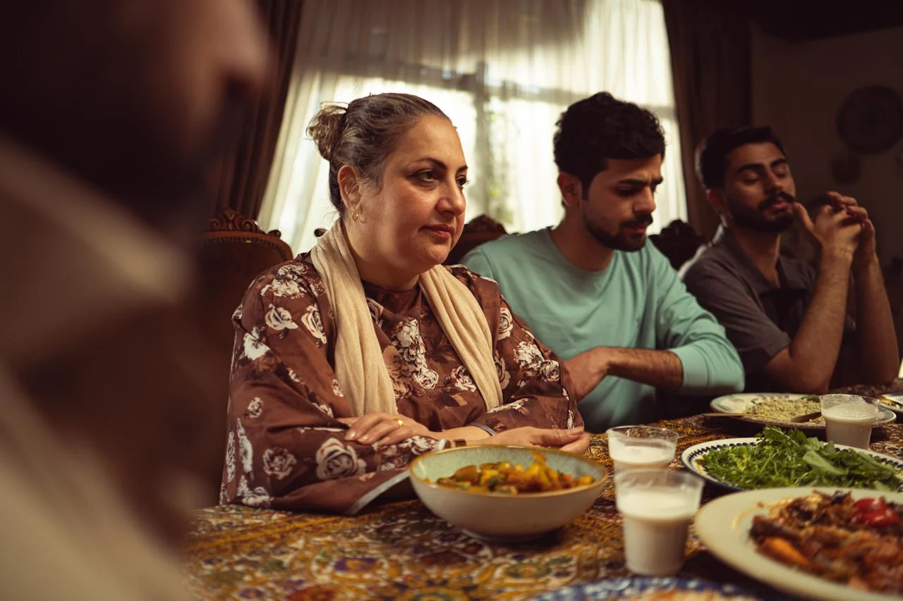 A South Asian family sharing a meal together — rebuilding family connection is one of the most powerful porn recovery tips, and a key step in learning how to quit porn and restore trust